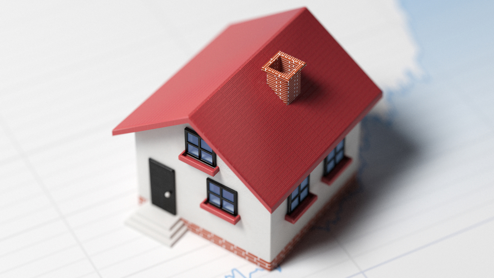Miniaturhaus mit rotem Dach